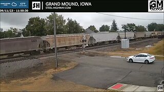 EB Manifest with Old Passenger on end of train in Belle Plaine and Grand Mound, IA on 9-11-23