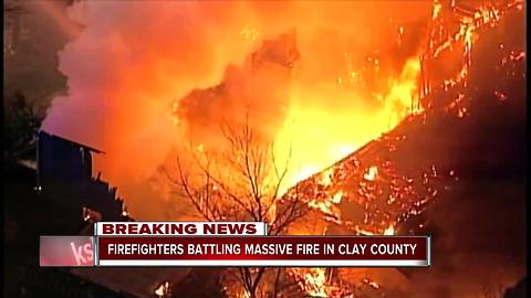 Crews battle massive house fire in rural Clay County
