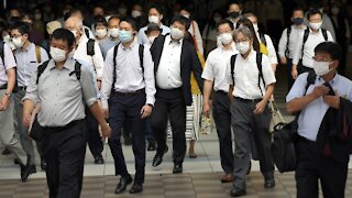 Tokyo New Virus Cases Near 2,000 A Day Before Olympics Open