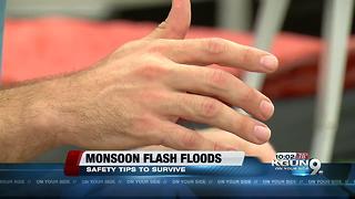 Hikers help each other out of dangerous flash floods in Sabino Canyon