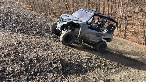 Rmax 1000 climbs the loose shale cliffs!