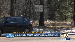 Cold storm brings snow to local mountains