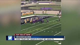 Kids play on in youth football despite fight by adults