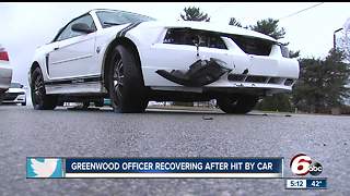 Greenwood police officer hit by car while directing traffic