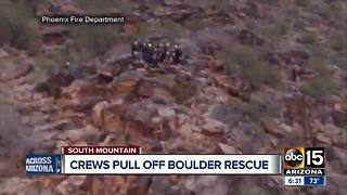 Crews pull off dangerous rescue of woman trapped by boulders at South Mountain