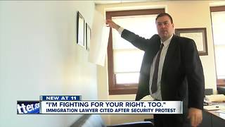 Immigration lawyer cited after security protest