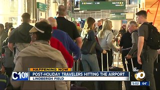 Post-holiday travelers hitting the airport