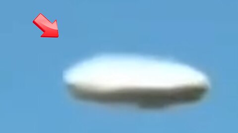 Witnessed a white UFO hovering in mid-air above the field.
