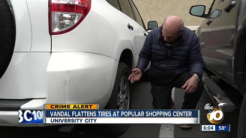 Vandal flattens tires at popular shopping center