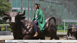 Seventeen year old graduates from USF