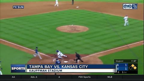 Adeiny Hechavarria shimmies past Salvador Perez at plate as Rays squeak past Royals