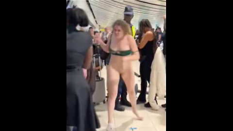 American Female dentist strips naked at Jamaican International Airport: video