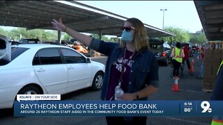 Raytheon teams up with food bank in drive-thru food donation event