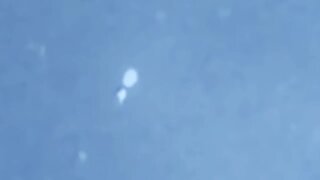 sphere UFO shows up out of the NE