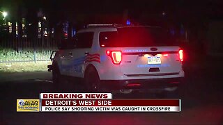 Police say shooting victim was caught in crossfire