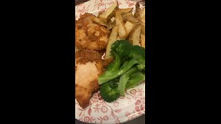 Fried chicken with French fries plus broccoli.