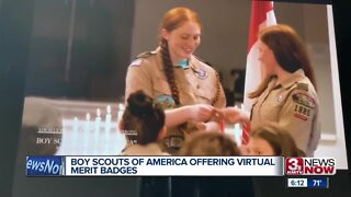 Boy Scouts handing out virtual merit badges