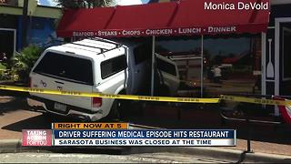 Man crashes car into restaurant at busy beach plaza