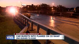 One rushed to hospital after fiery crash on 33 overpass