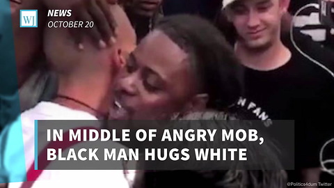 In Middle of Angry Mob, Black Man Hugs White Nationalist. Reveals What God Whispers in His Ear