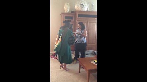 She just graduated pharmacy school, so here's her at-home graduation ceremony