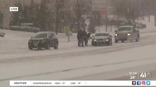 Cars stuck in snow in Olathe