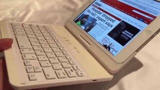 White bluetooth keyboard travel case with rotating cover for Apple iPad mini review