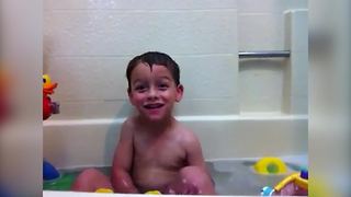 Tot Boy Sings While In A Tub