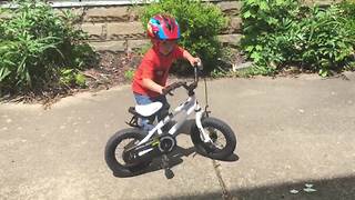 Little Boy Gets Frustrated Because He Can’t Ride His Bike Without Training Wheels