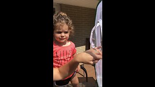 Super Cute- Little Girl releases butterfly