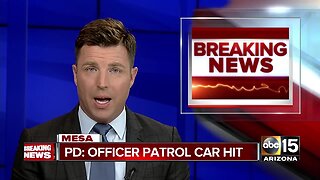 Mesa officer's patrol car hit