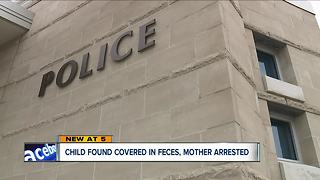 Child found covered in feces, mother arrested