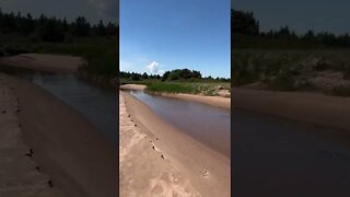 Little stream at the beach