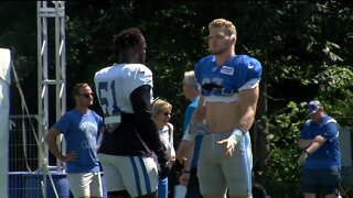 Former Michigan teammates Aidan Hutchinson, Kwity Paye catch up at Lions-Colts practices