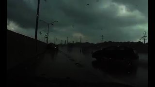 Officer escapes hydroplaning car at the last possible moment