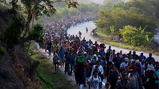 Border Invaders staging just yards away from American border...like an ARMY .