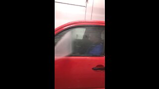 Crazy Guy Attacks Water in Carwash