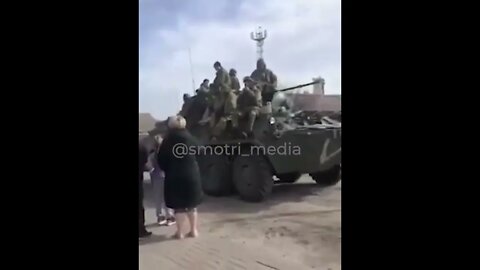 Ukrainians welcoming Russian Forces