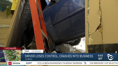 La Mesa business owner reacts after car crashed into store during slick conditions