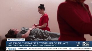 Massage therapists say they are losing work because of licensing delay