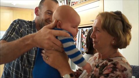 Grandparents Meet Their First Grandchild For The First Time