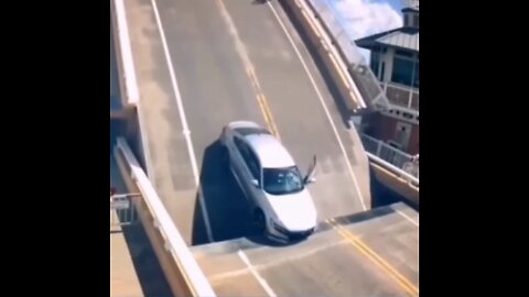 Car falls from opening bridge