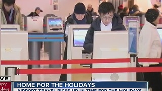 Airport travel picks up in time for the holidays