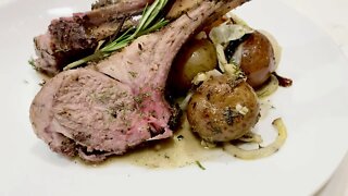 RACK OF LAMB WITH SIDE OF BAKED POTATOES