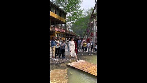 A woman running on feet on water