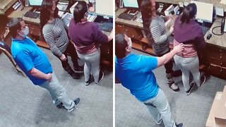 Front desk employee falls over after epic coworker prank