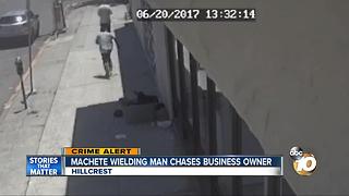 Machete wielding man chases business owner