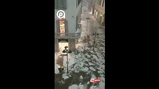 After heavy rains in Italy the streets become rivers of ice
