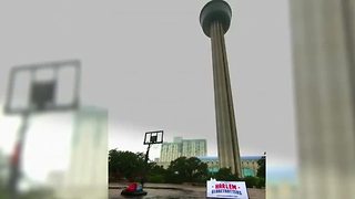 Harlem Globetrotters' star shoots basket from top of tower