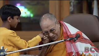 Dalai Lama apologises after kissing young boy on the lips